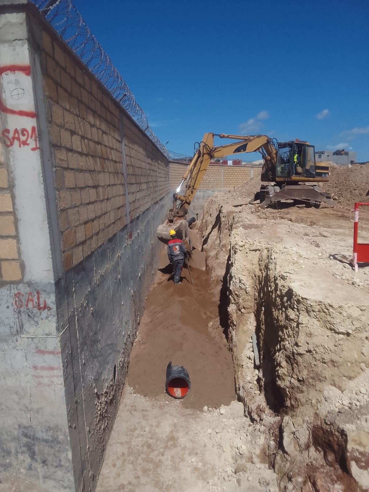 Finition d'un quai voyageurs accessible PMR